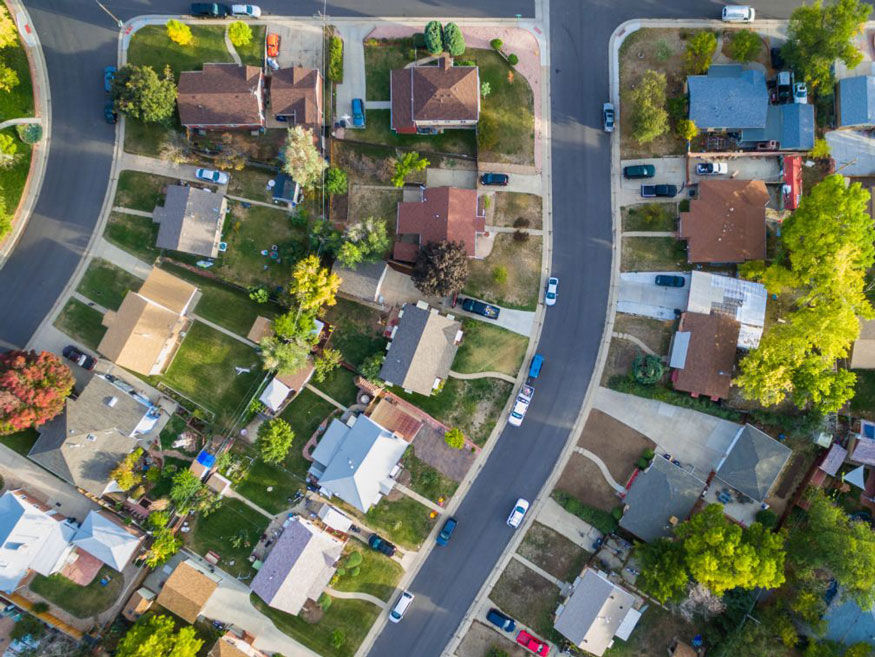 Aerial view of a residential neighborhood with homes and streets